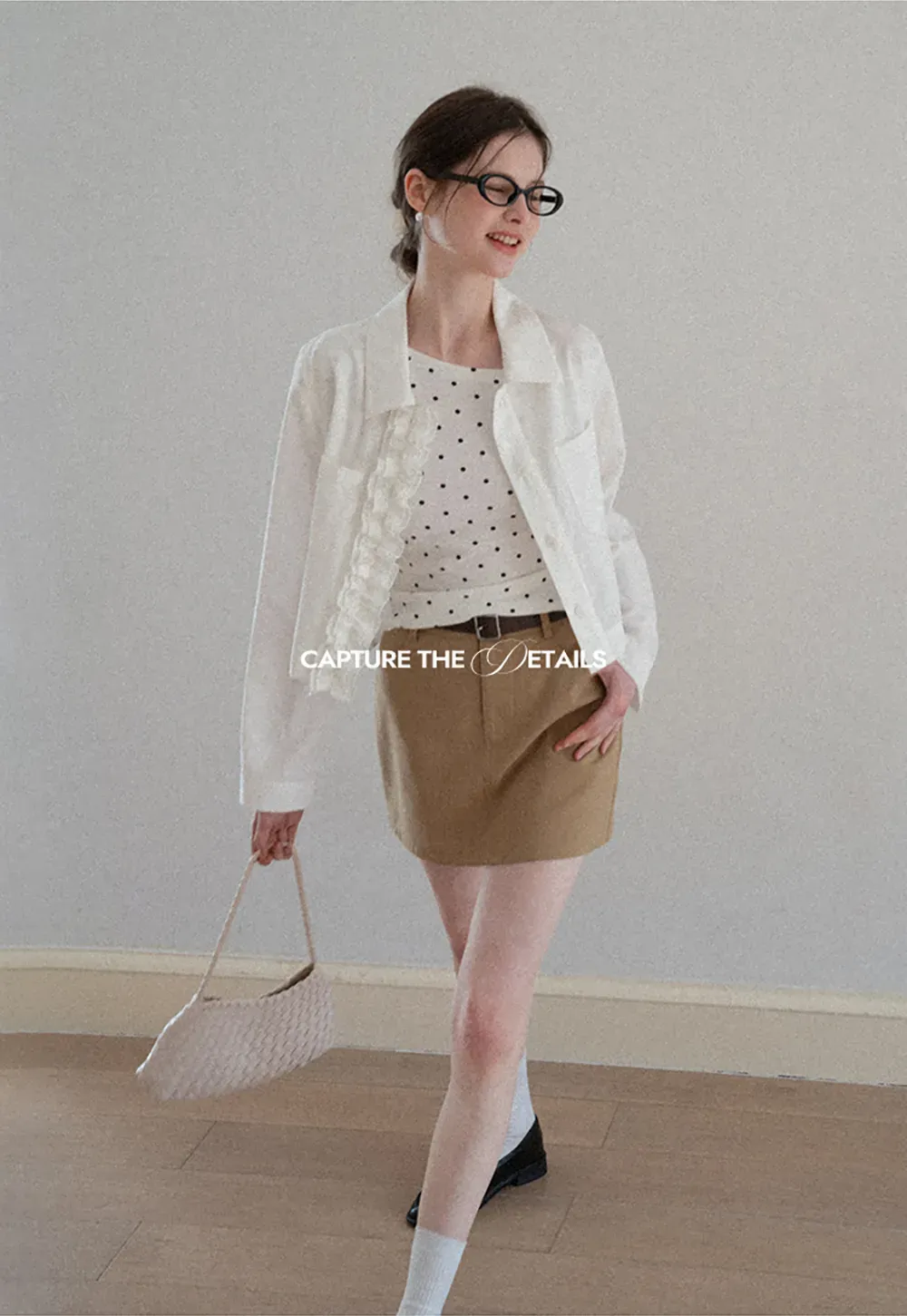 Short jacket with ruffled front placket and collar