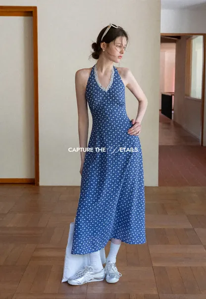 Halter neck dress with floral print and lace trim