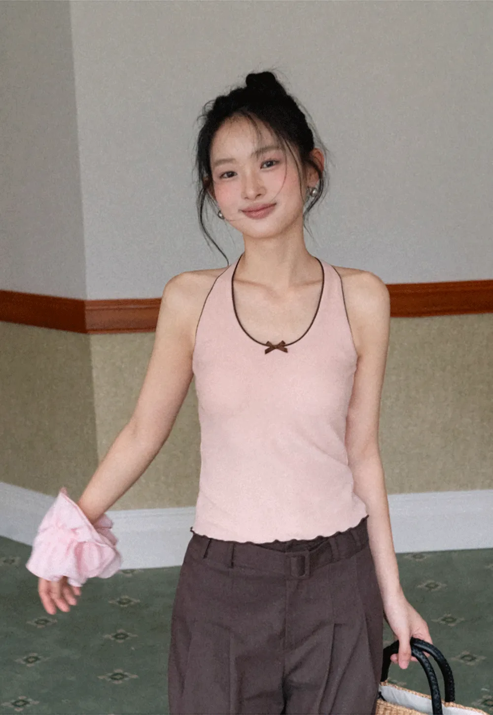 Halter neck tank top with thin straps and bow detail