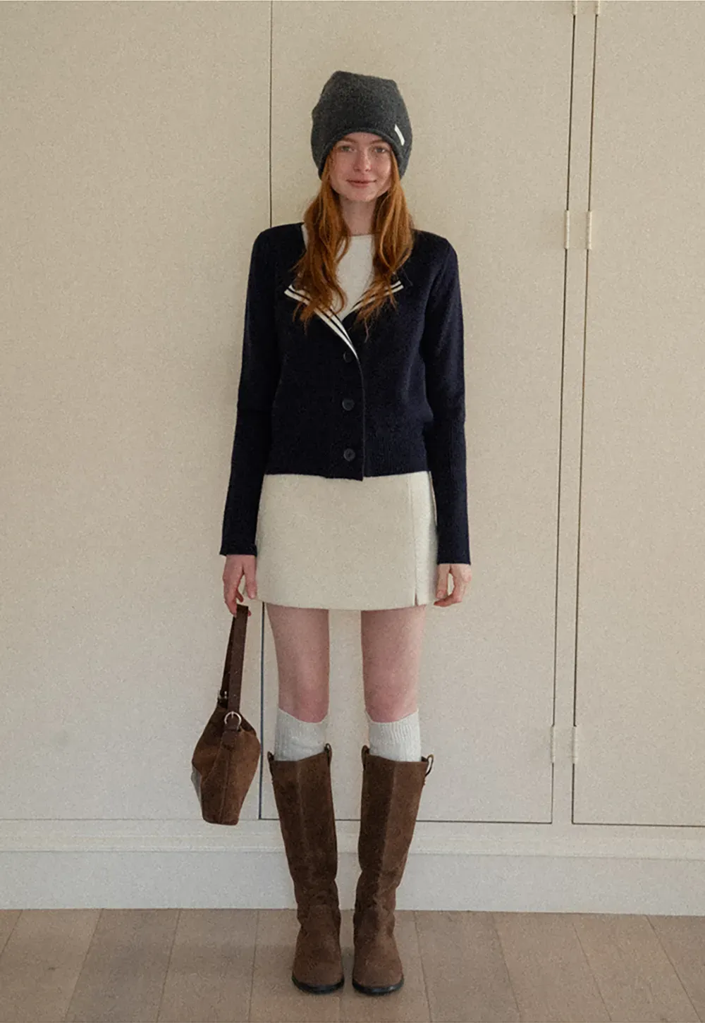 A-line mini skirt with textured fabric and central seam design