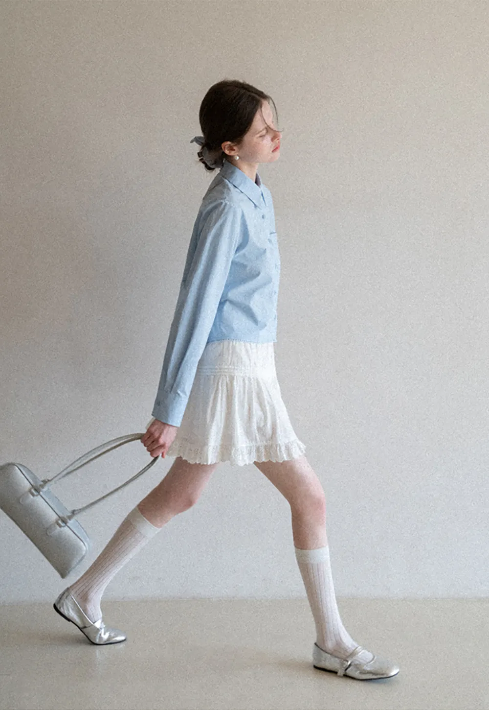 Long sleeve button front shirt with scalloped hem