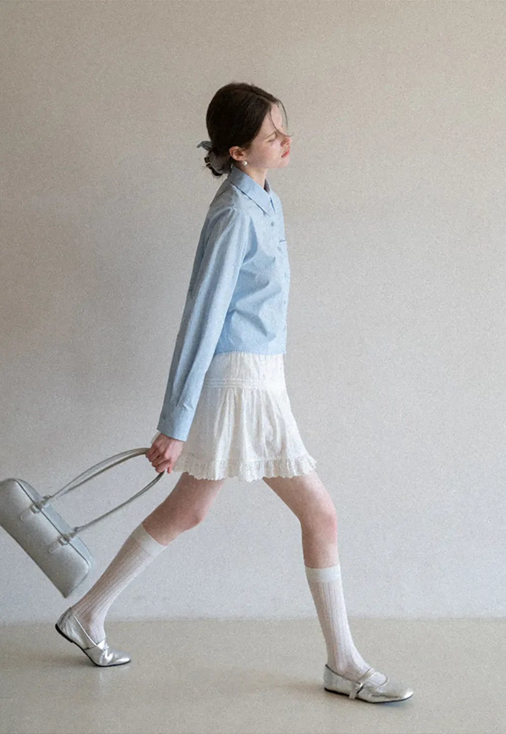 Long sleeve button front shirt with scalloped hem