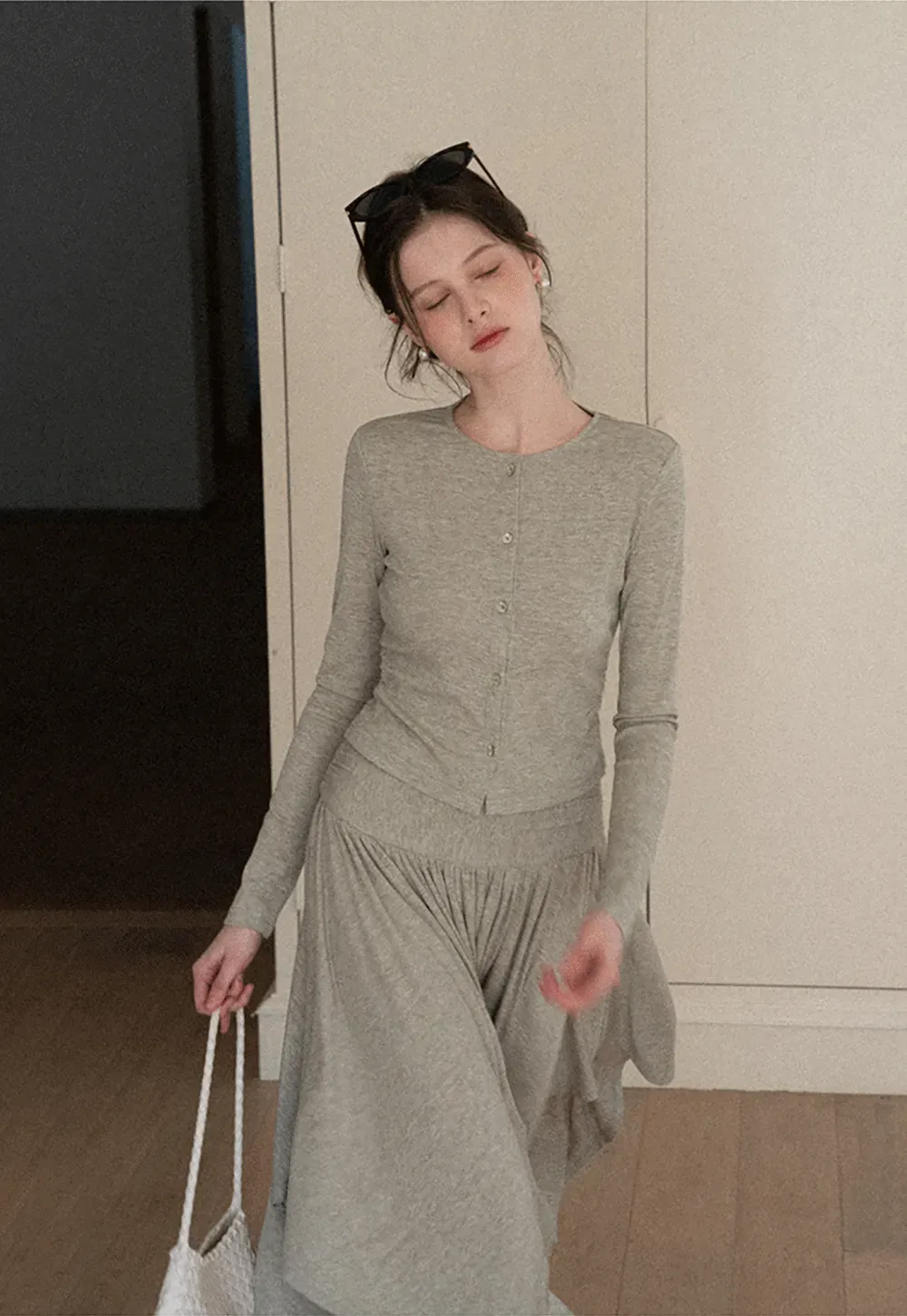 Long sleeve button front top and asymmetrical skirt