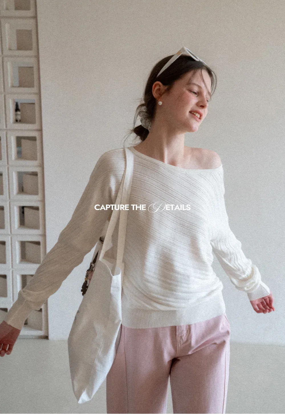 Ribbed knit sweater with wide neckline and long sleeves