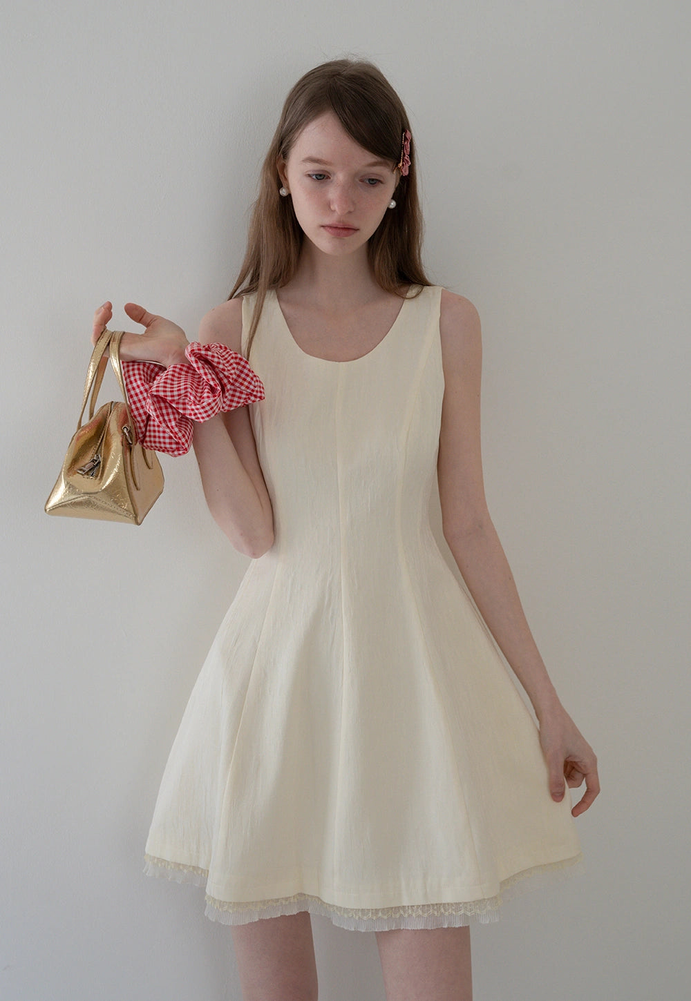 Sleeveless Textured A-Line Dress with Lace Hem