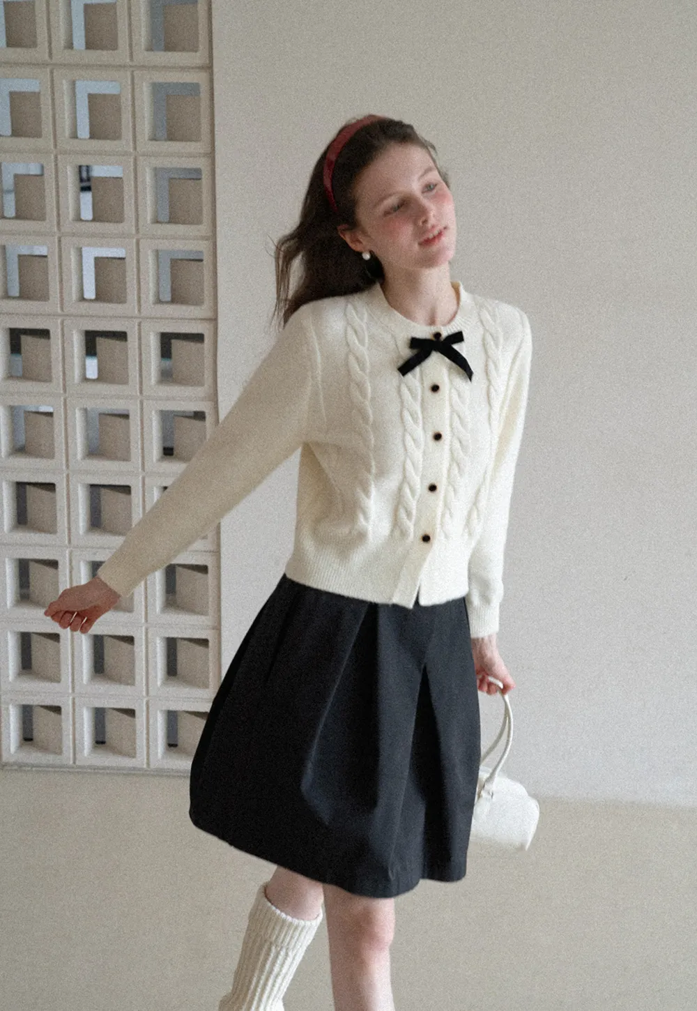 Elegant Cable Knit Cardigan with Bow Detail