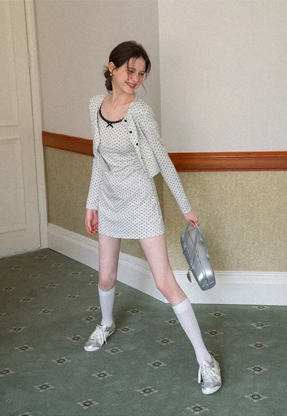 Polka dot dress with lace trim and matching cardigan