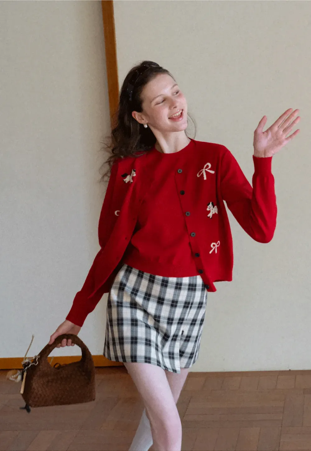 Woolen knit sweater with horse and bow motifs