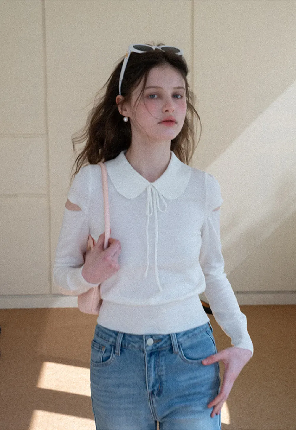 Elegant Knit Sweater with Bow Detail and Cutout Sleeves