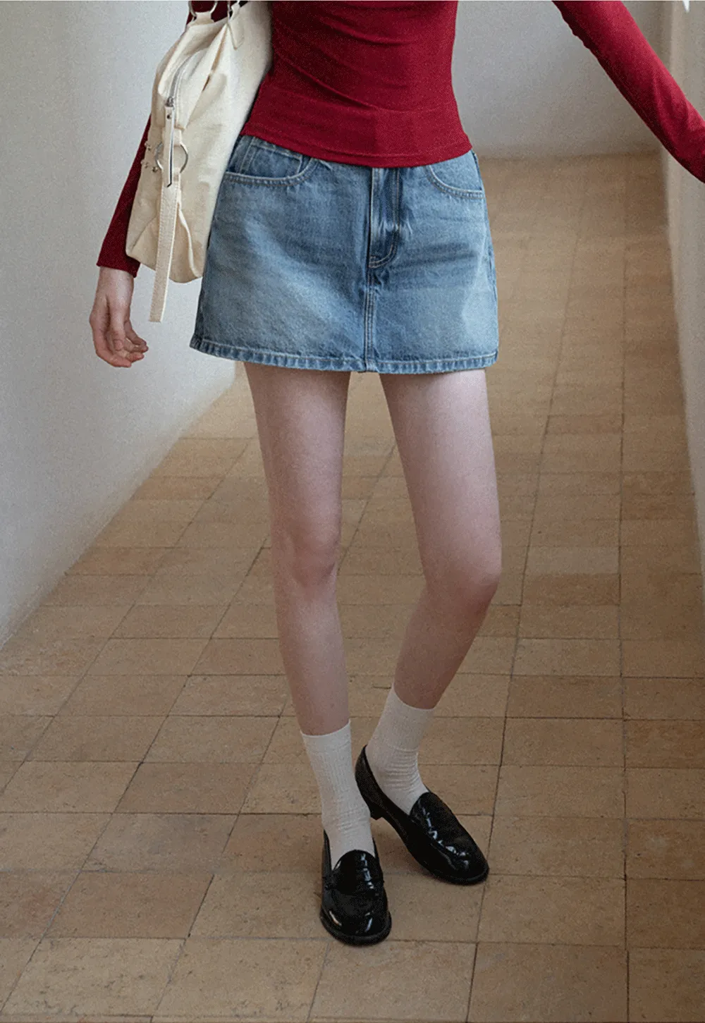 Denim Mini Skirt with Front Pocket and Frayed Hem