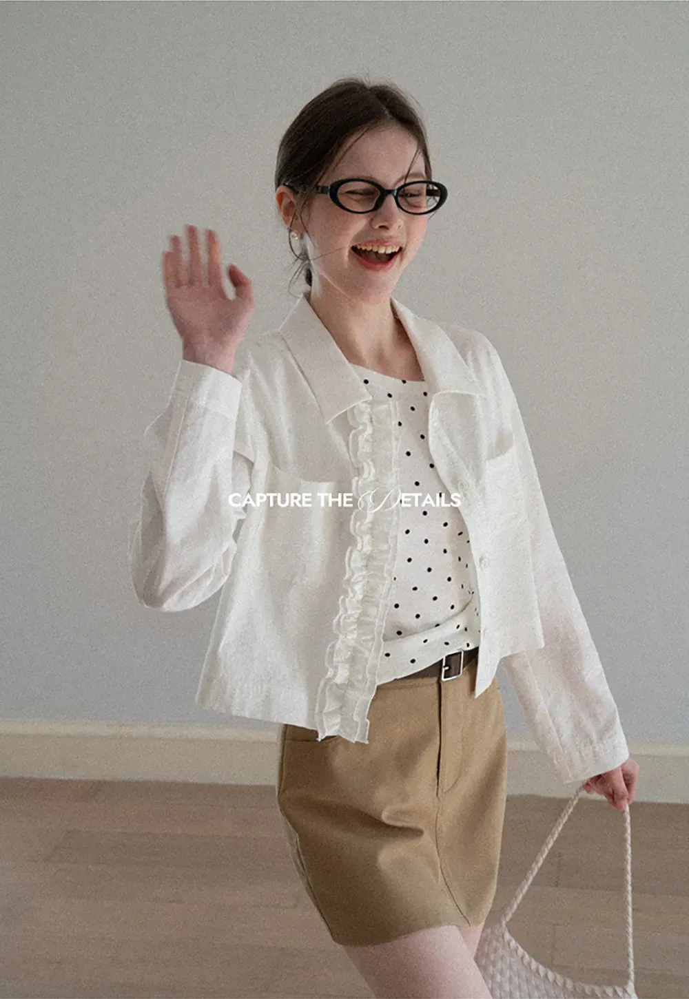 Short jacket with ruffled front placket and collar