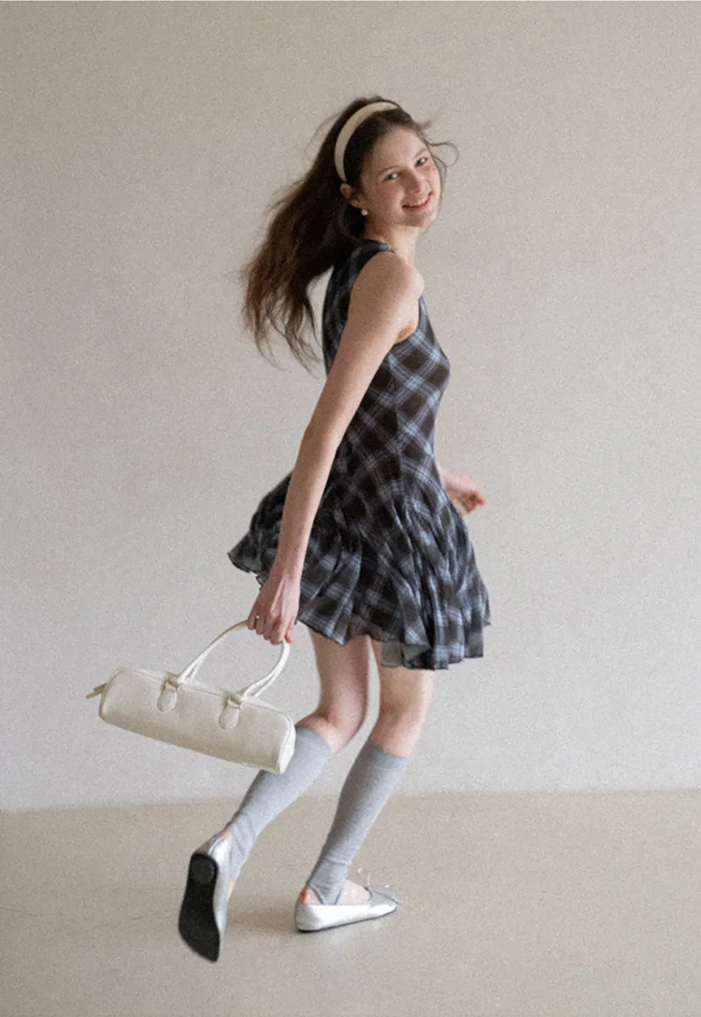 Plaid sleeveless dress with flared skirt