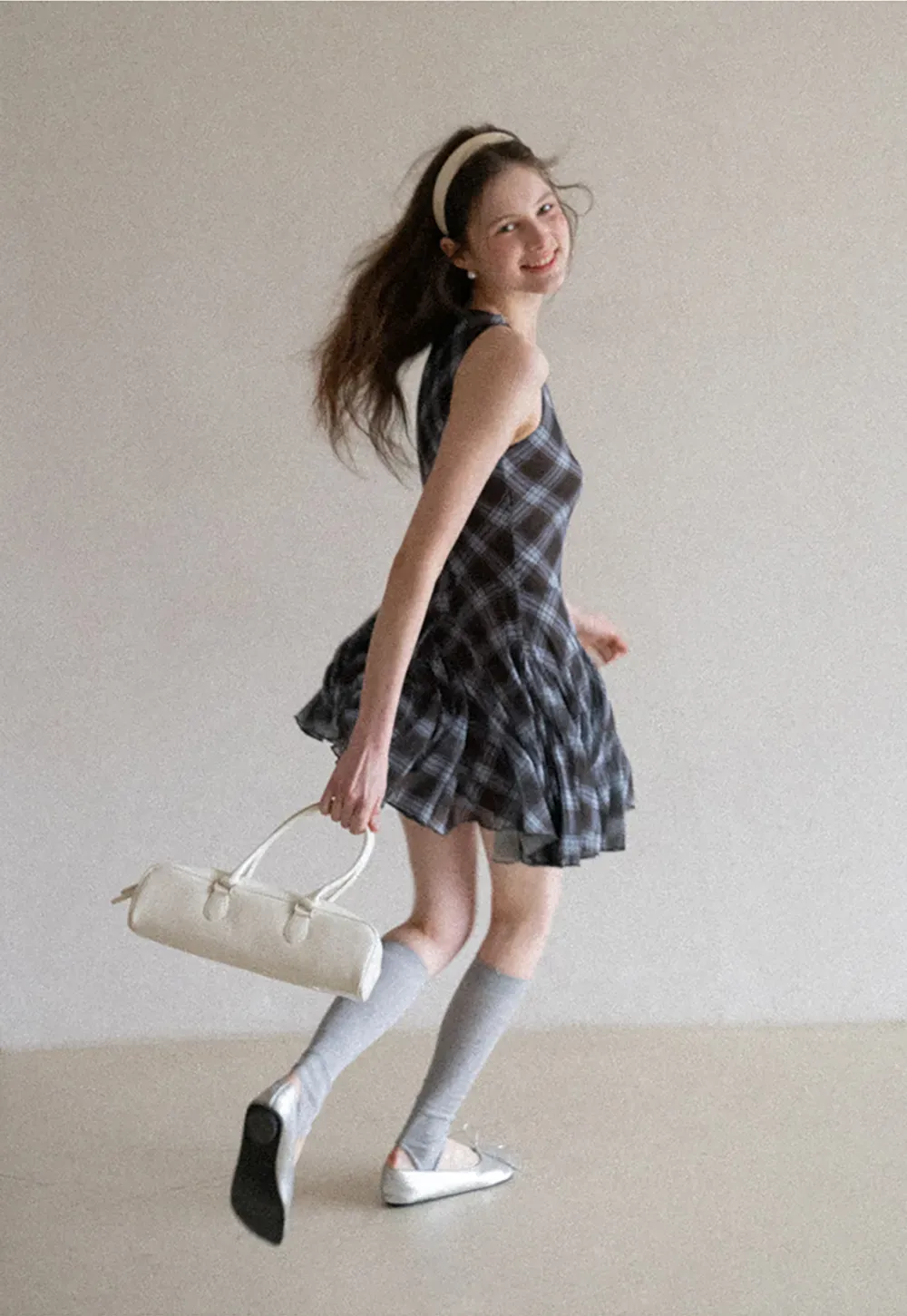 Plaid sleeveless dress with flared skirt