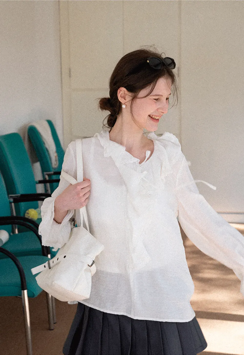 Elegant Blouse with Ruffled Neckline and Flared Sleeves