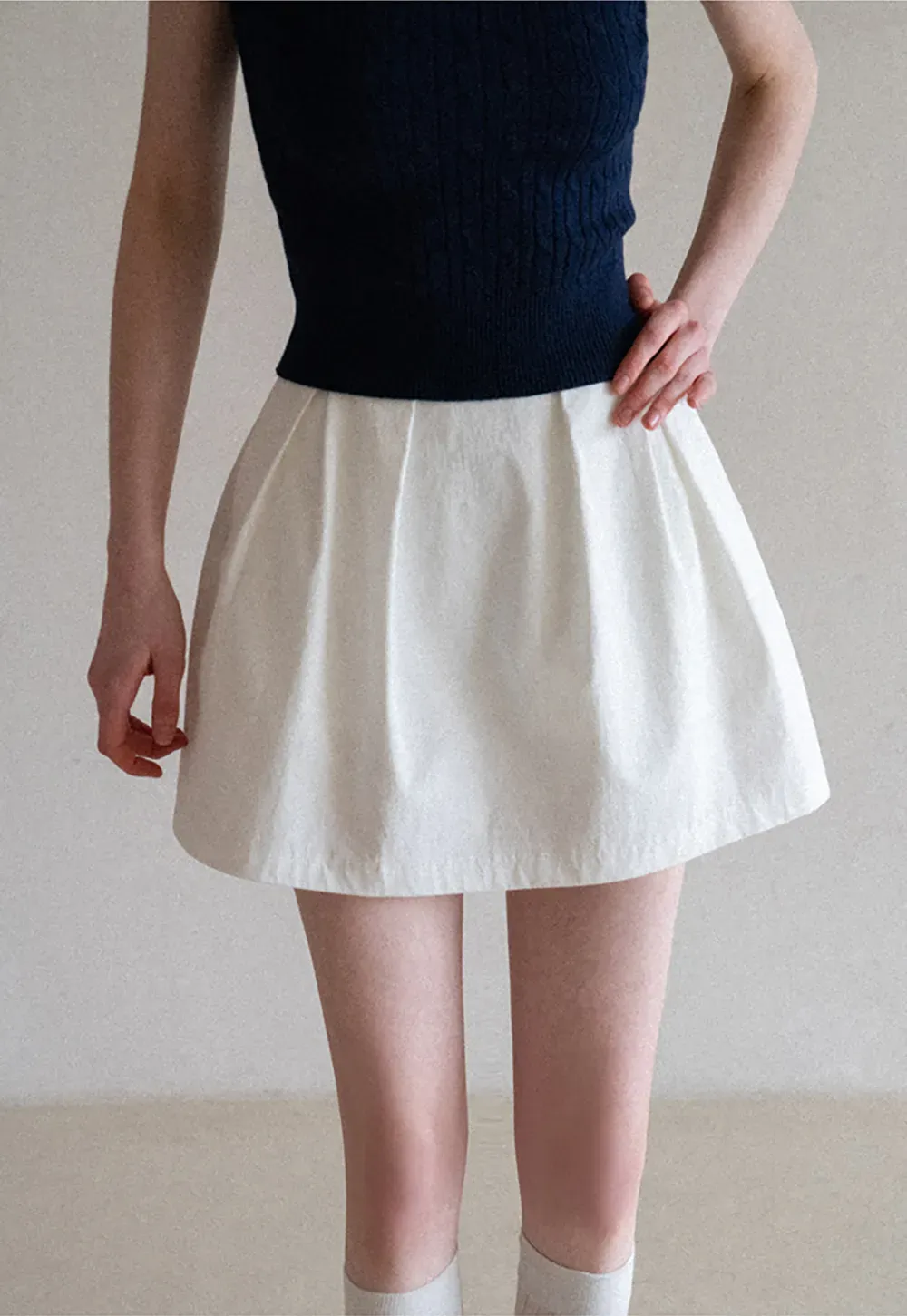 Plaid skirt with pleats and ruffled top