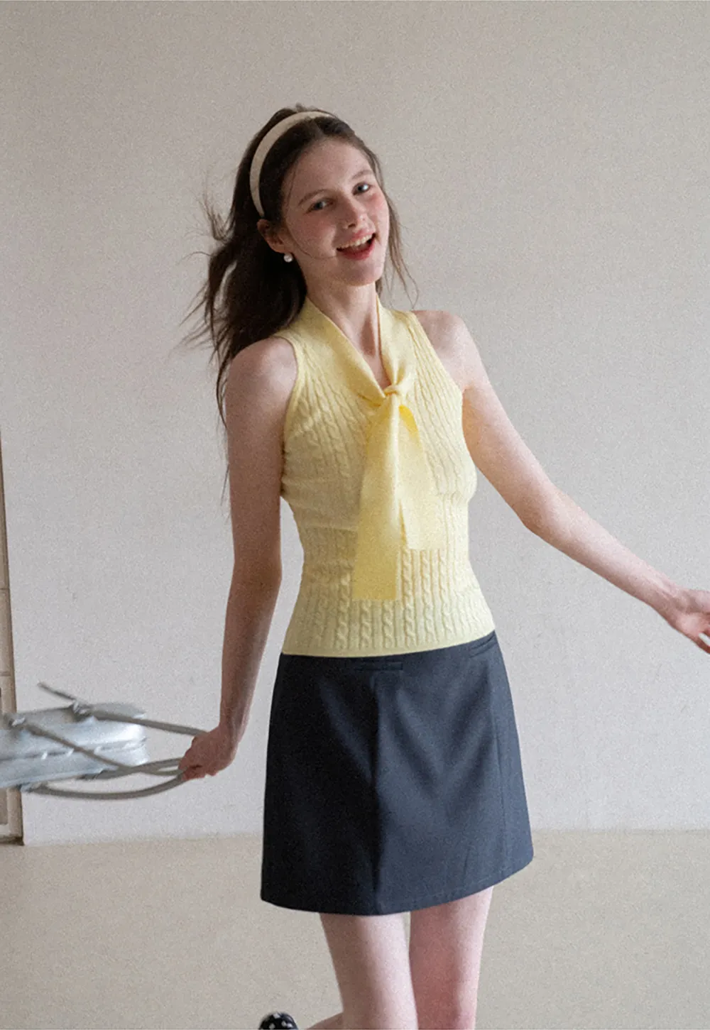 Knit Sleeveless Top with Front Bow Detail