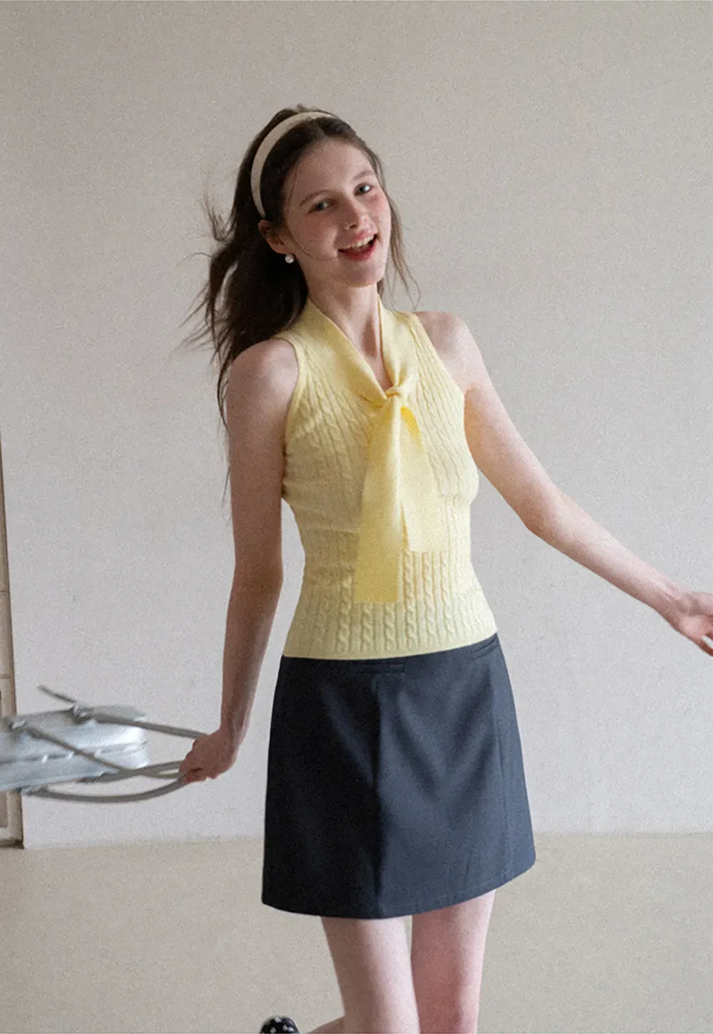 Knit Sleeveless Top with Front Bow Detail