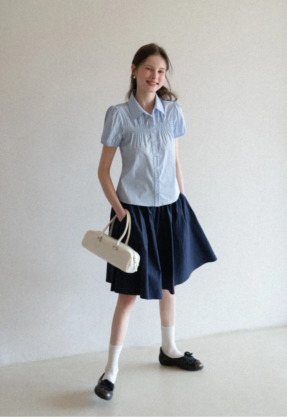 A-line pleated midi skirt with waistband