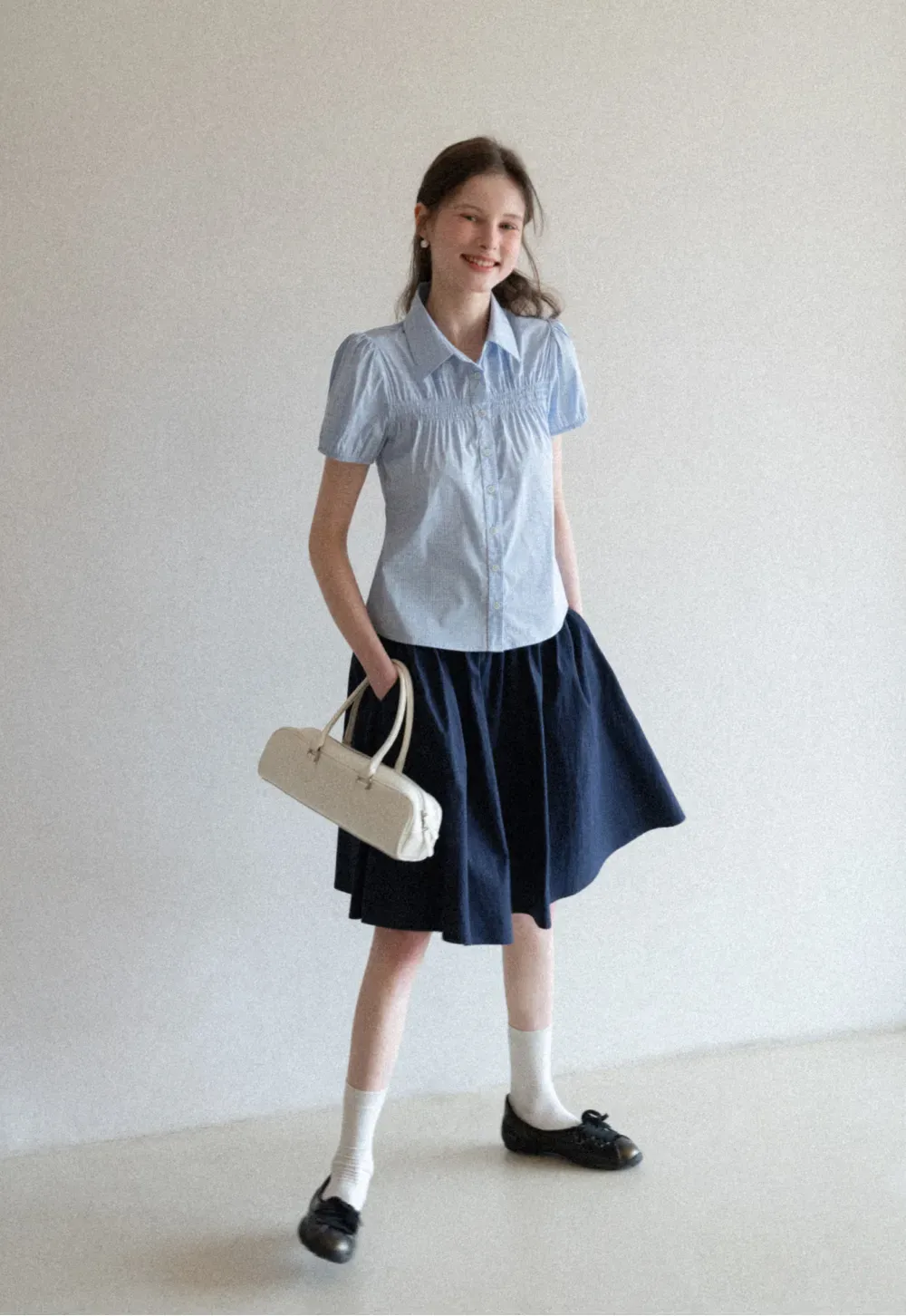 A-line pleated midi skirt with waistband