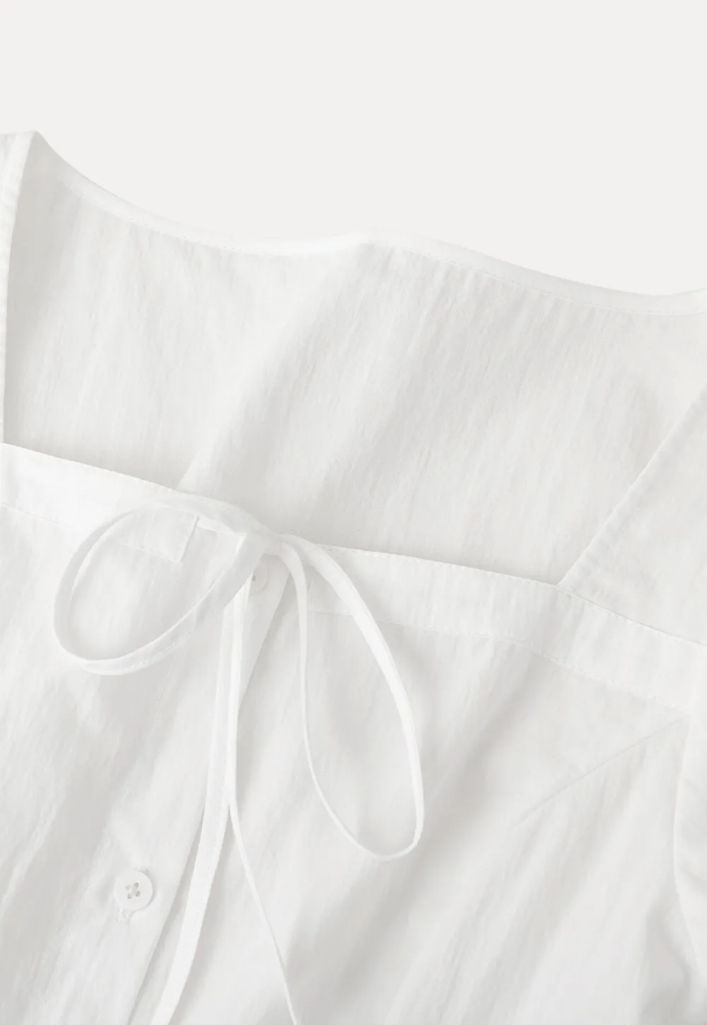 Square neck puff sleeve blouse with ruffle hem