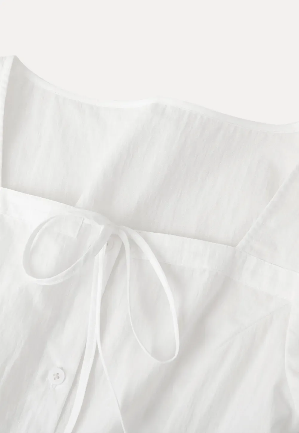 Square neck puff sleeve blouse with ruffle hem