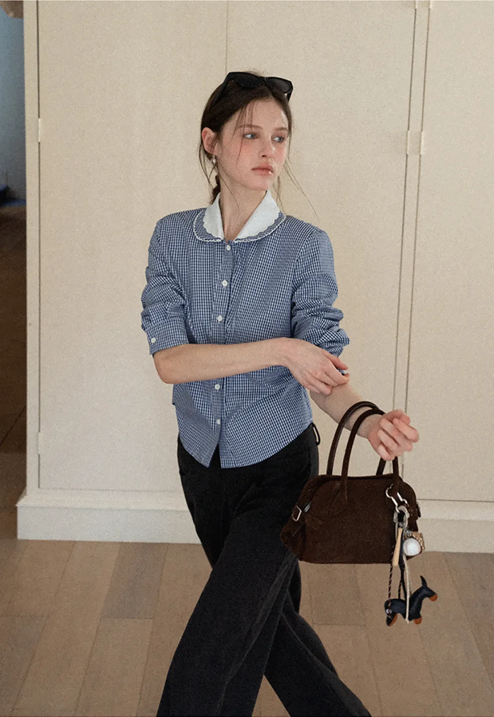 Elegant blouse with scalloped collar and long sleeves for versatile styling