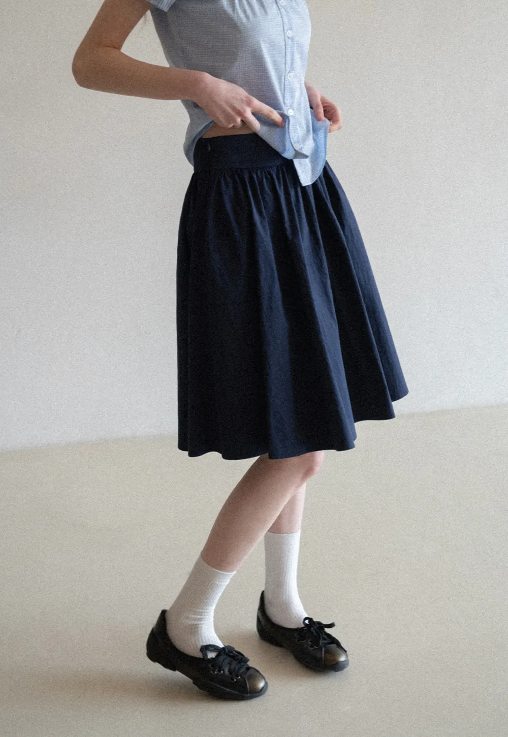 A-line pleated midi skirt with waistband