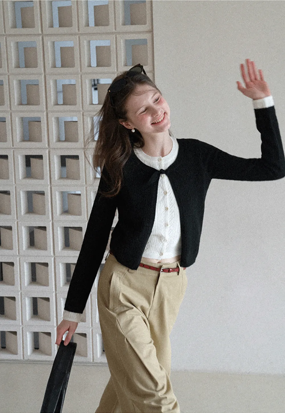 Elegant Knit Cardigan with Bow Detail and Ribbed Texture