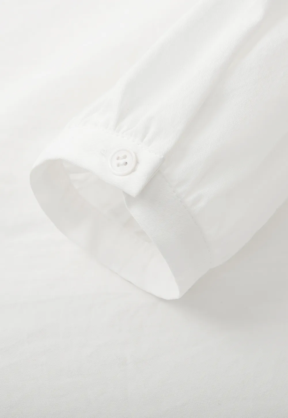 Elegant Blouse with Ruffled Collar and Pintuck Detail