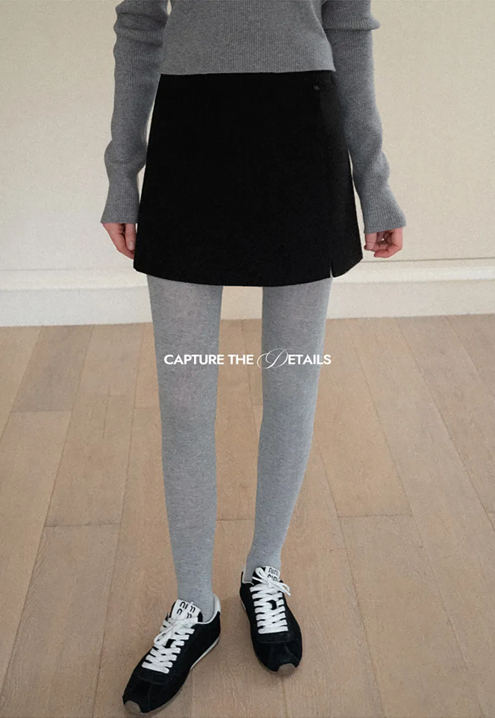 A-line mini skirt with textured fabric and central seam design