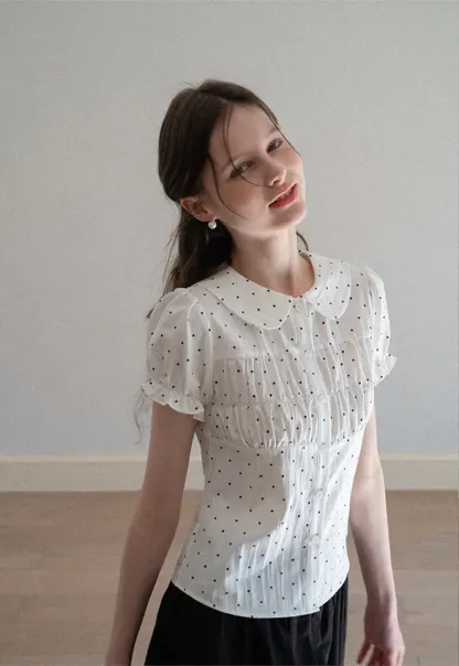 Polka dot shirt with ruffled sleeves and Peter Pan collar