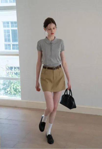A-line mini skirt with front pockets and belt loops