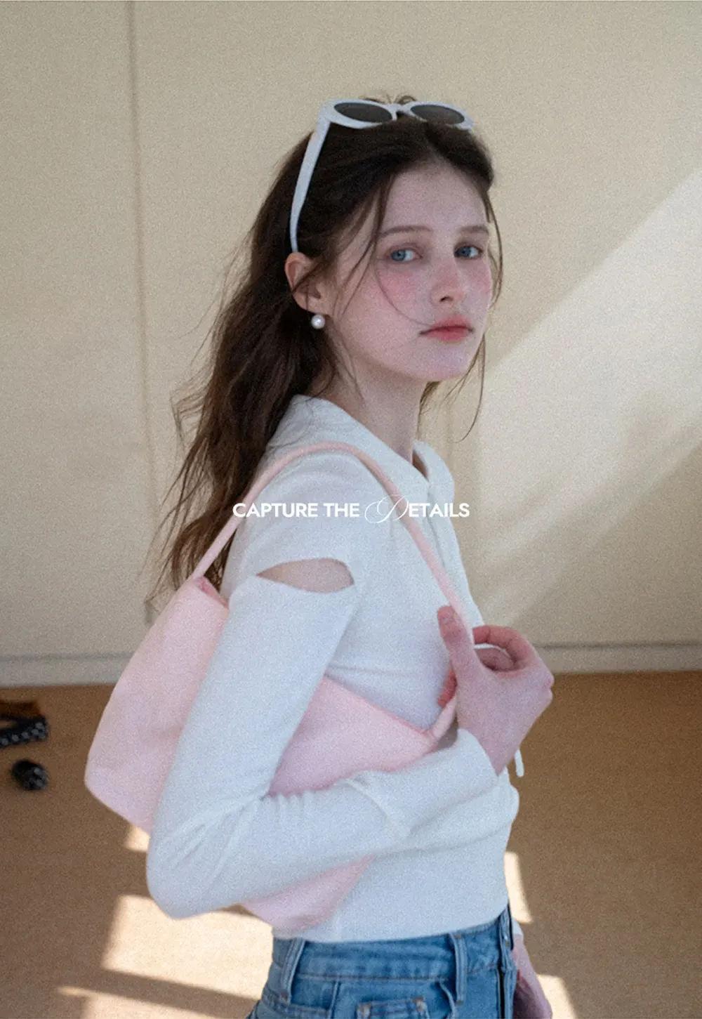 Elegant Knit Sweater with Bow Detail and Cutout Sleeves