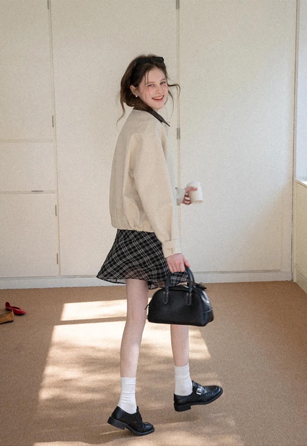 Short jacket with contrast collar and front buttons