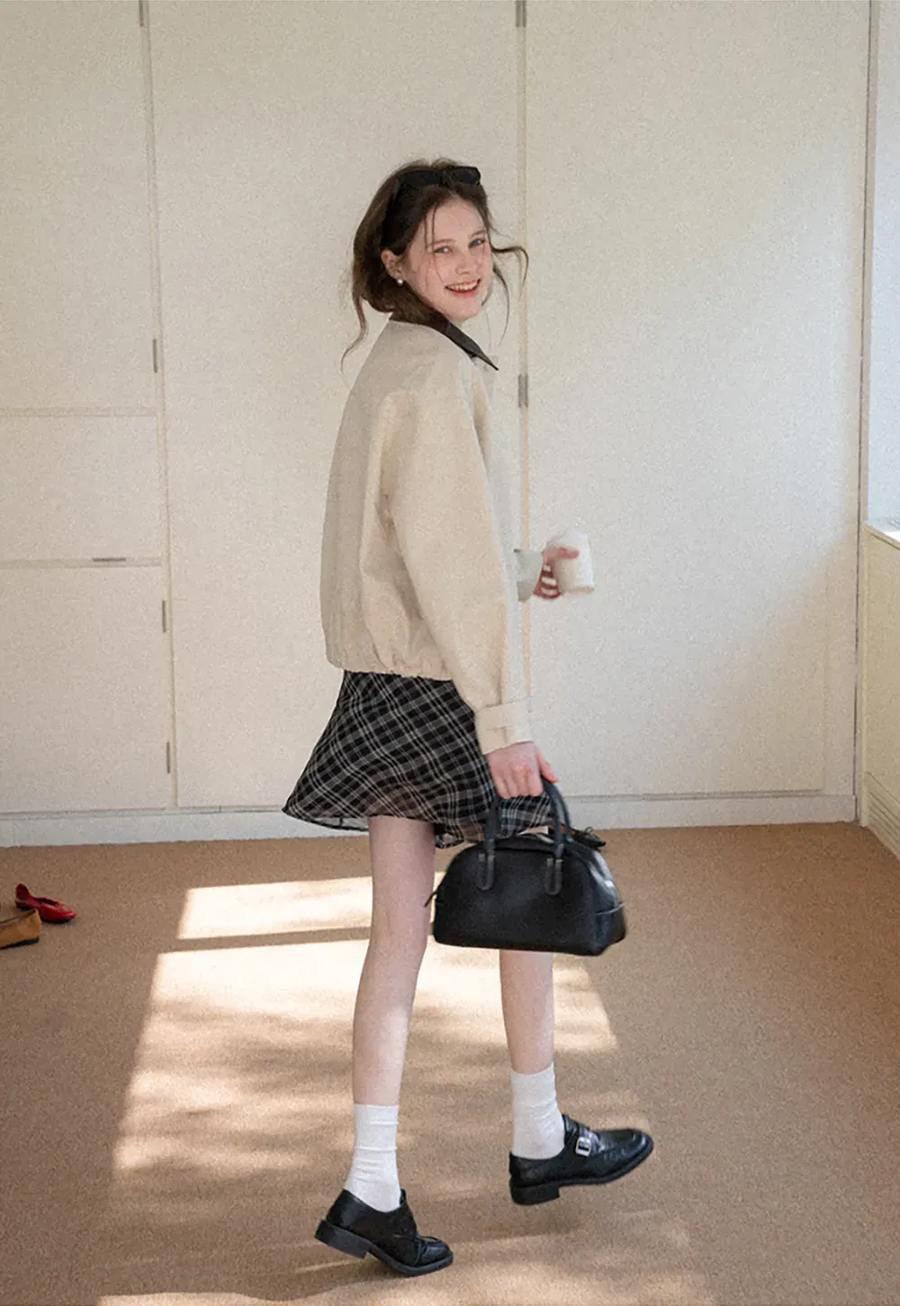 Short jacket with contrast collar and front buttons