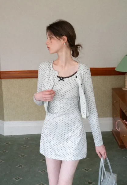 Polka dot dress with lace trim and matching cardigan