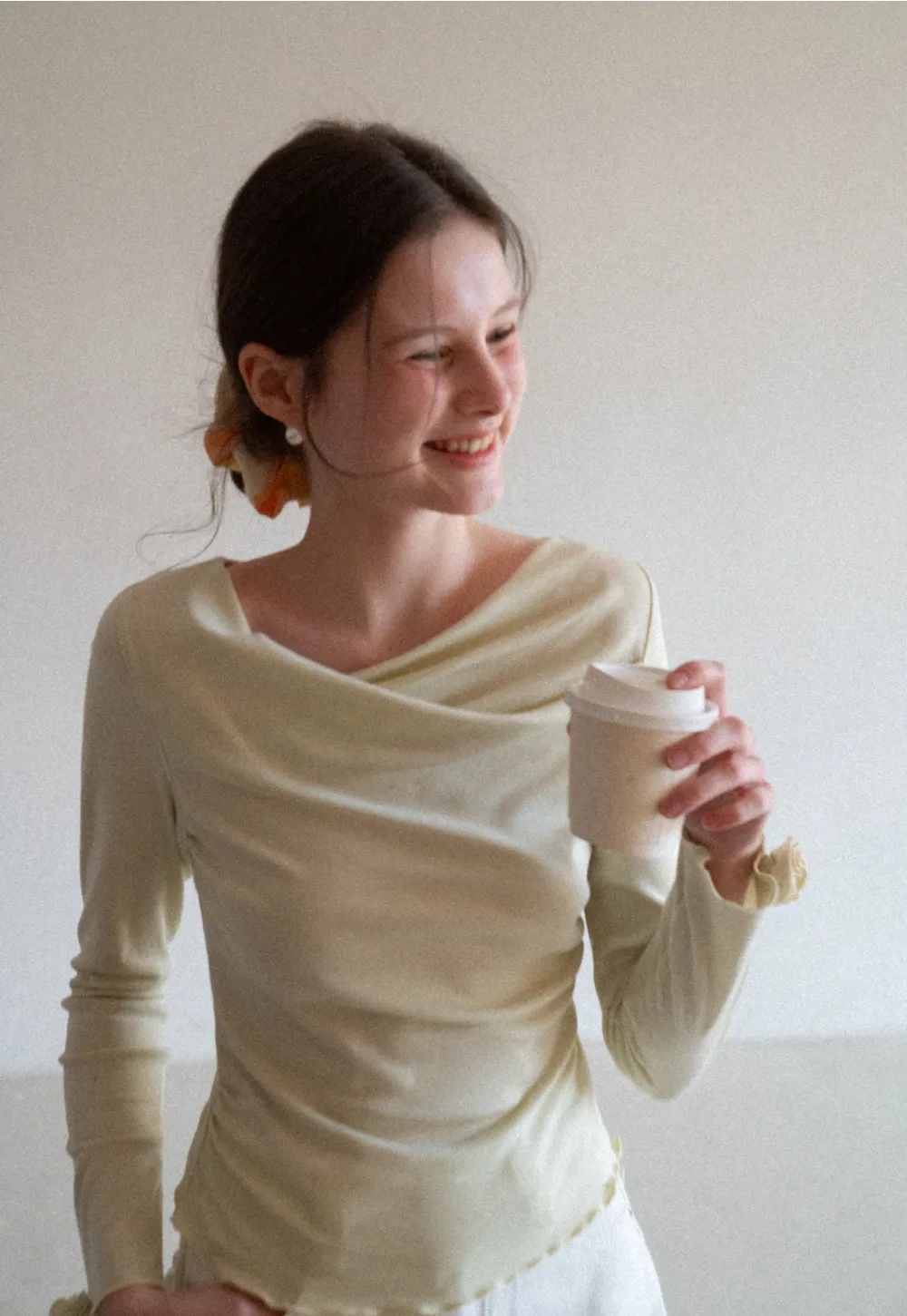 Long sleeve top with ruffled hem and cuffs