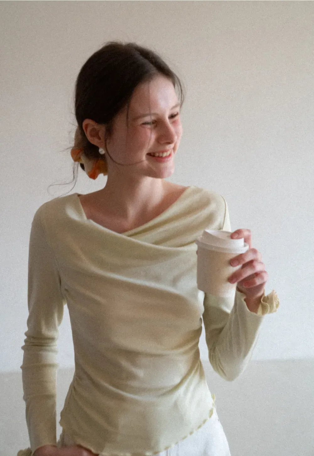 Long sleeve top with ruffled hem and cuffs