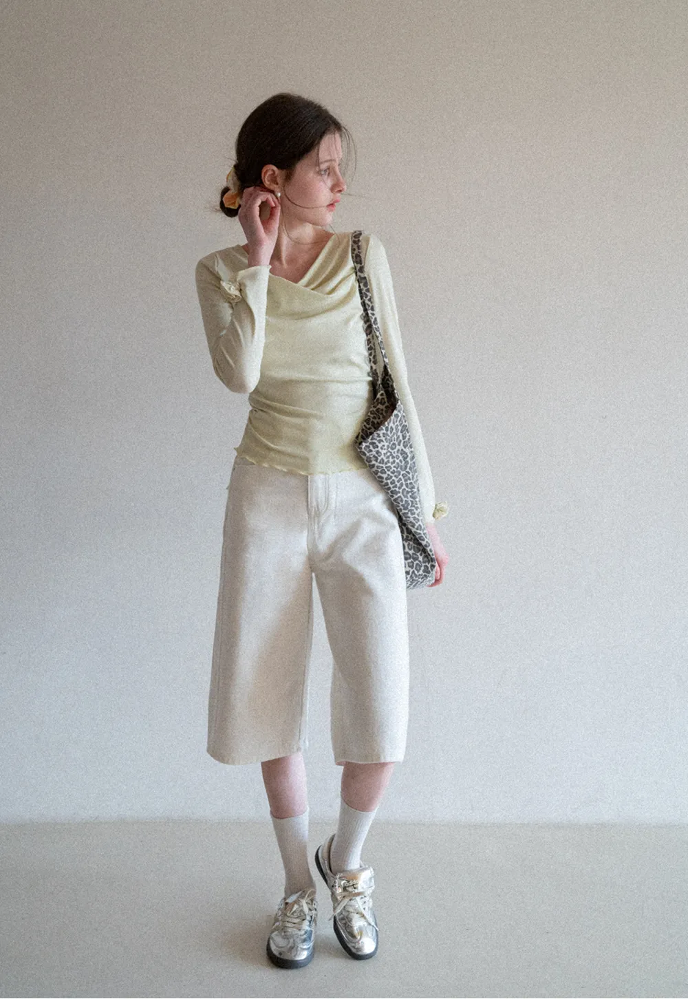 Long sleeve top with ruffled hem and cuffs