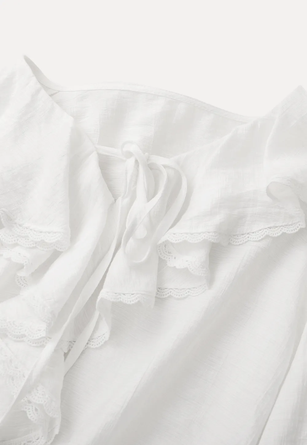 Elegant Blouse with Ruffled Neckline and Flared Sleeves