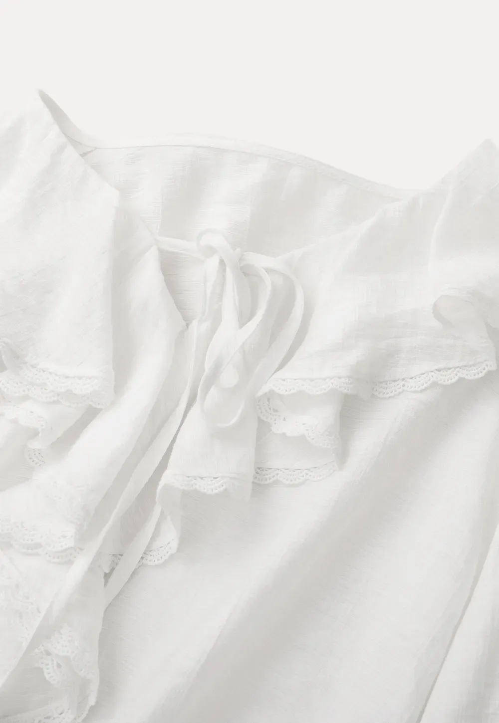 Elegant Blouse with Ruffled Neckline and Flared Sleeves