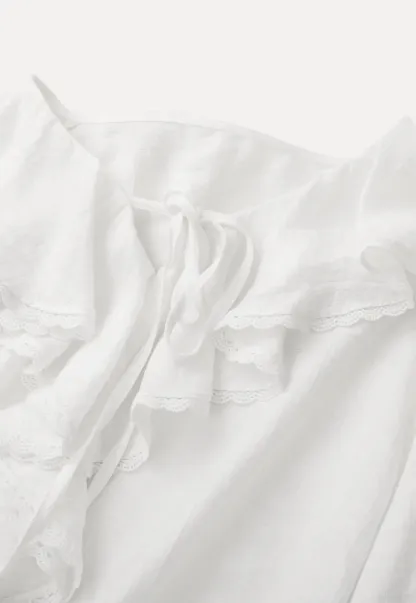 Elegant Blouse with Ruffled Neckline and Flared Sleeves