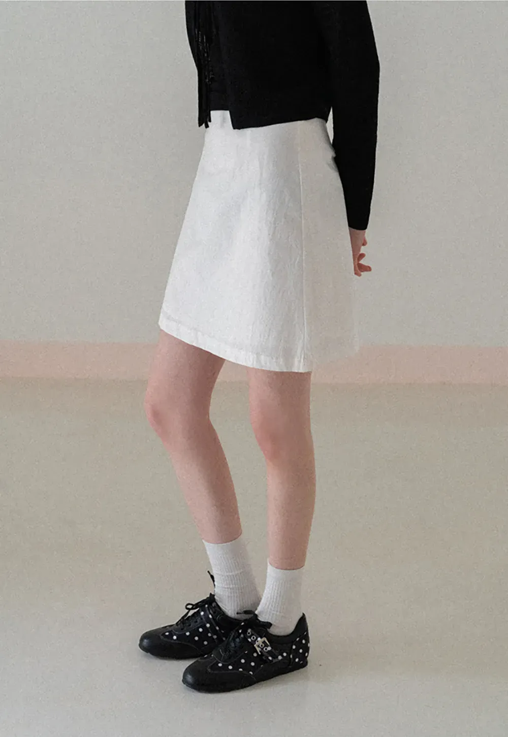 A-line mini skirt with front darts and clean hem