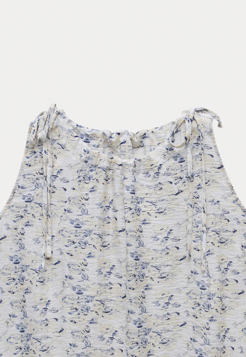Floral Sleeveless Blouse with Ruffle Hem