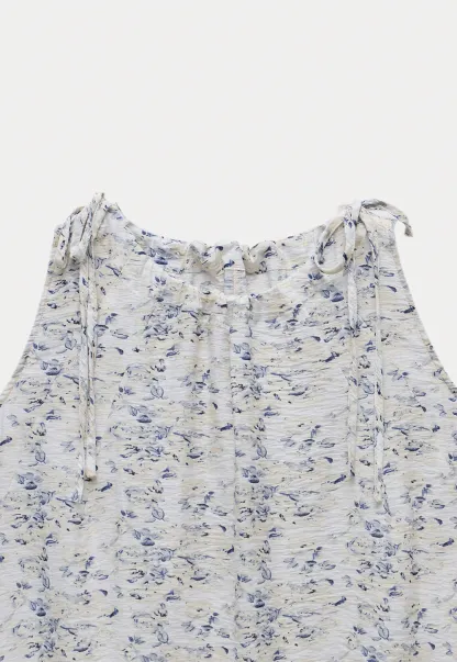 Floral Sleeveless Blouse with Ruffle Hem