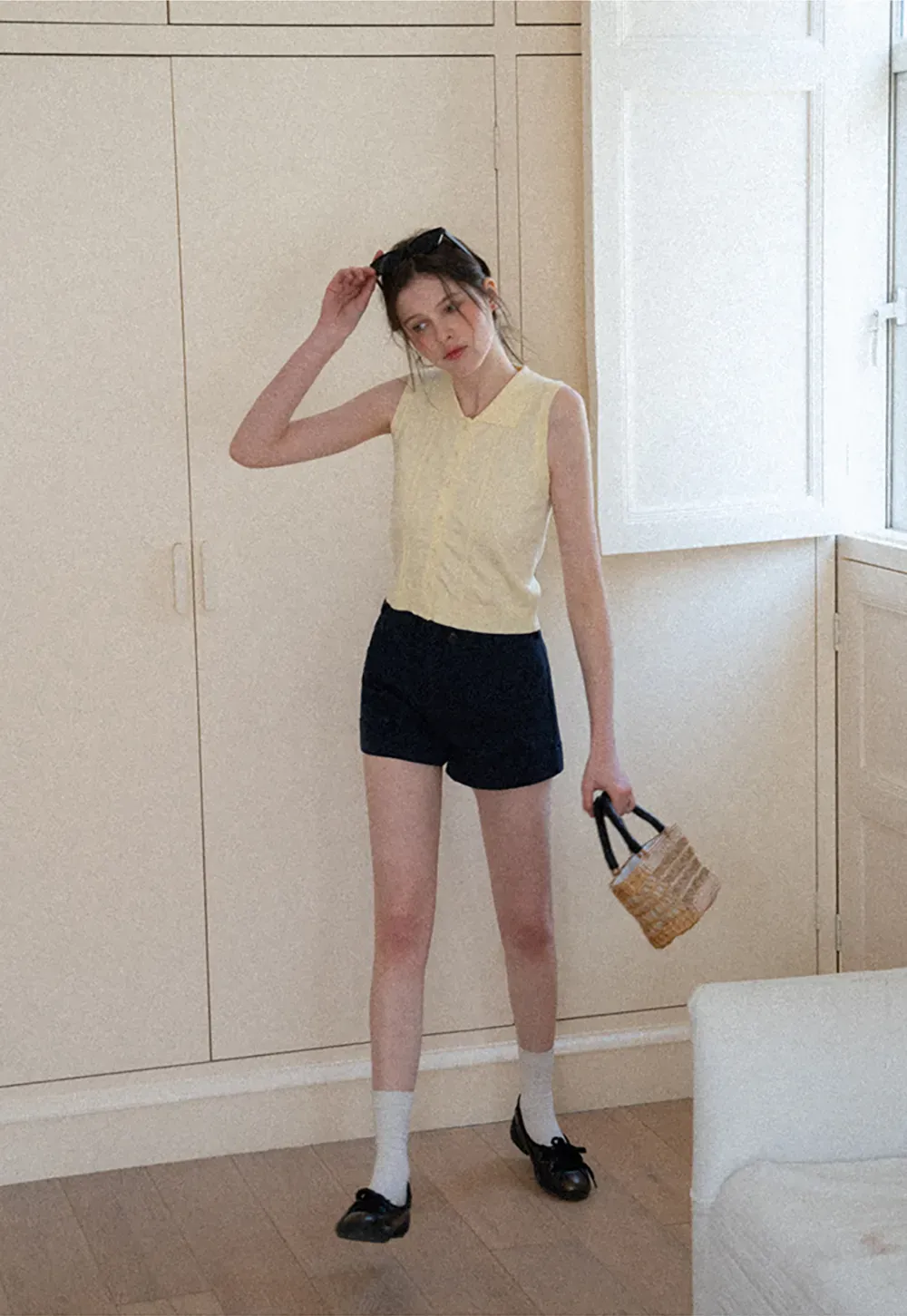 Sleeveless Knit Top with Collar and Buttons