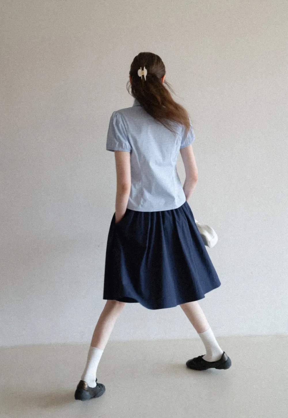 A-line pleated midi skirt with waistband