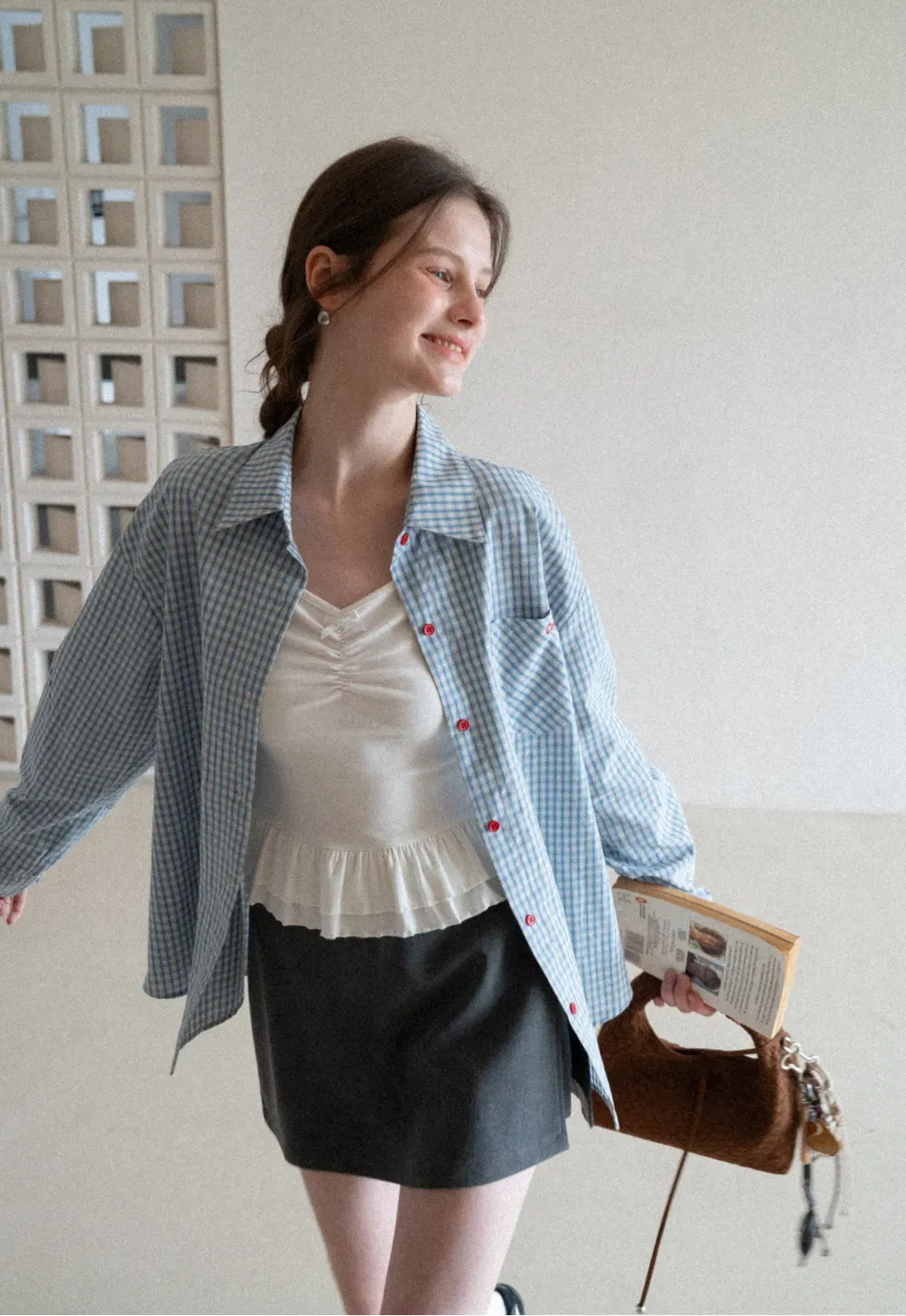 Elegant Pleated Mini Skirt with Asymmetrical Hem