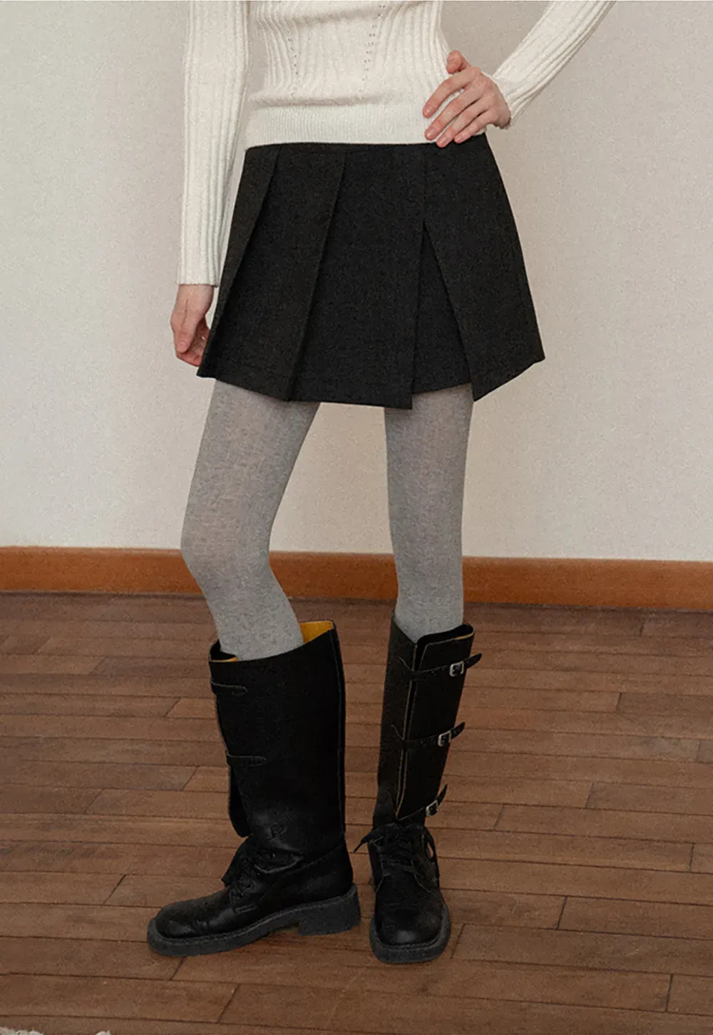 Elegant Pleated Mini Skirt with Tights and Boots Combo