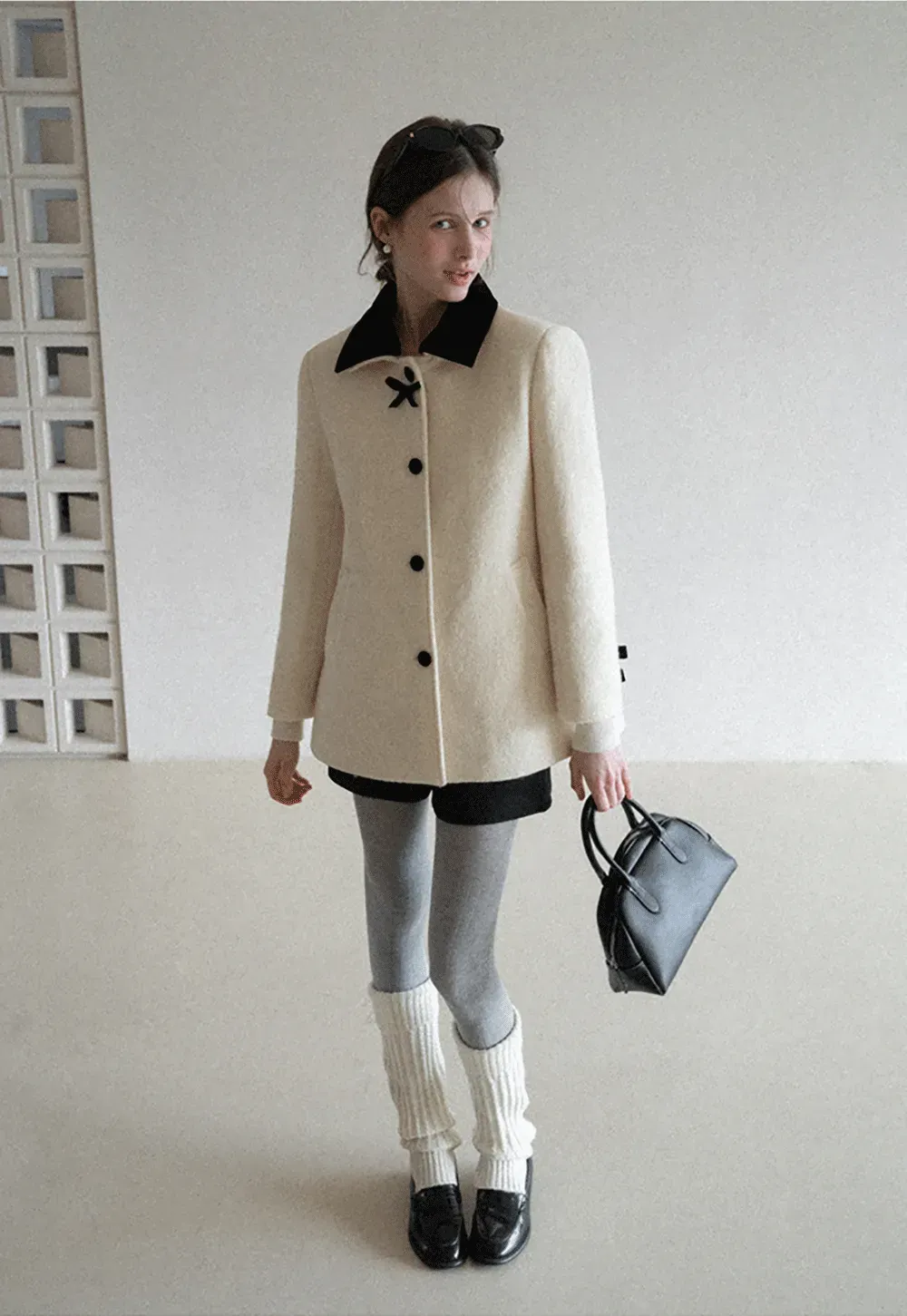 Elegant Wool Coat with Bow Detail and Contrasting Collar